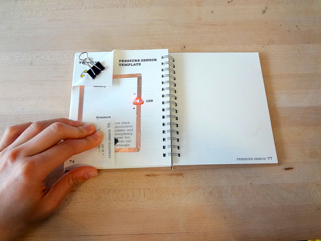 Circuit sticker sketchbook. Image by Jie Qi. Via www.flickr.com. Taken on April 26, 2014. License: Attribution 2.0 Generic 3.0 Link: https://flic.kr/p/nebmpw.